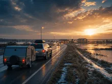 Highway toward Texas at dawn after a winter storm — roads opening and light breaking through, illustrating God's provision during the February 2021 move from New York.